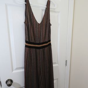 Fancy jumpsuit perfect for special occasion.